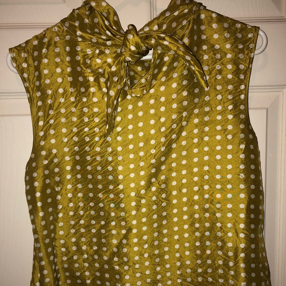 Olive polkadotted sleeveless work top. Size 4